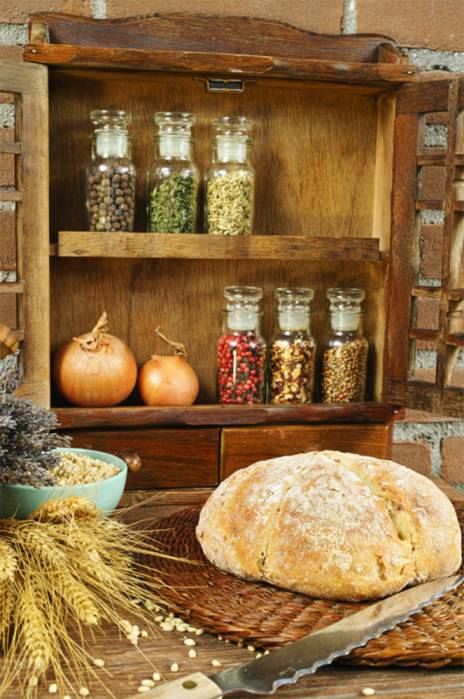 https://www.cabinetnow.com/product_images/uploaded_images/a-small-spice-cabinet-on-a-table-with-bread-and-a-knife.jpg